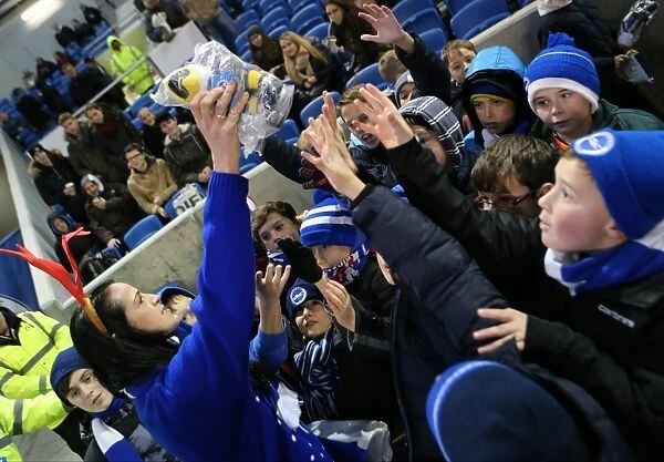Brighton and Hove Albion vs Millwall: A Festive Rivalry - Fans Share Christmas Cheer Amidst Championship Clash (12DEC14)