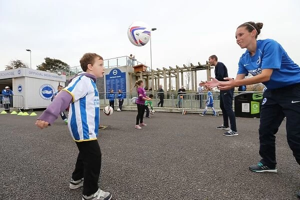 Brighton and Hove Albion Women's Team: Empowering the Next Generation at the Fanzone Ahead of the Match vs. Middlesbrough (18OCT14)