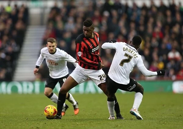 Intense Rivalry: Rohan Ince Faces Off Against Opponent in Derby vs. Brighton Championship Clash (Dec 2014)