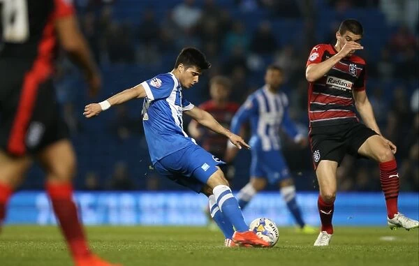 Joao Carlos Teixeira in Action: Brighton Midfielder Fights for Possession against Huddersfield Town (April 2015)