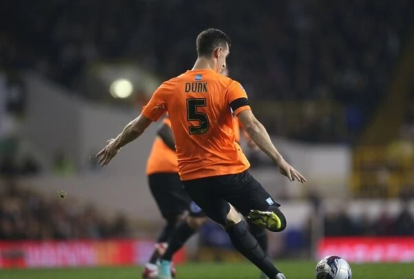Lewis Dunk in Action: Tottenham vs. Brighton & Hove Albion in the Capital One Cup