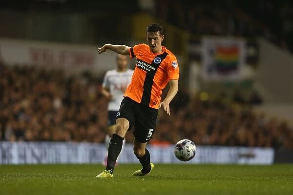 Lewis Dunk in Action: Tottenham vs. Brighton & Hove Albion in the Capital One Cup