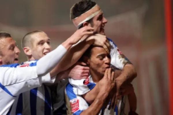 Buy Bennett celebrates his goal