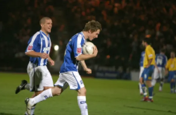 Buy Jake Robinson celebrates his hat-trick goal