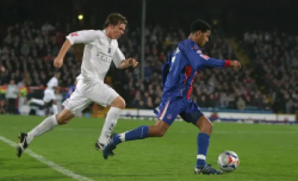 Buy Dean Hammond chases Jobi McAnuff