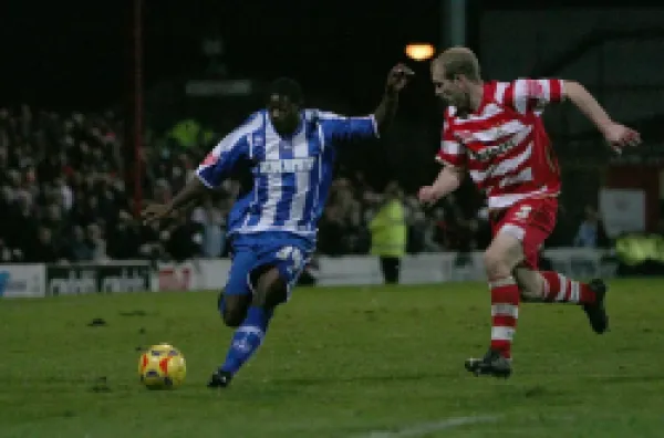 Buy Alastair John, on his Albion debut, takes on Gareth Roberts