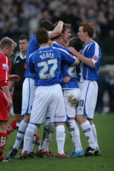 Buy Dean Hammond celebrates his goal against Stafford Rangers