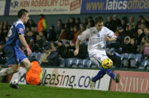 Buy Jake Robinson takes on Oldham's Neil Eardley