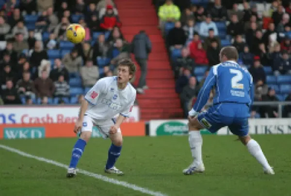 Buy Jake Robinson with Oldham's Simon Charlton