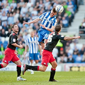 Intense Action: Craig Noone vs Portsmouth in the Championship Clash at Amex Stadium (March 10, 2012)