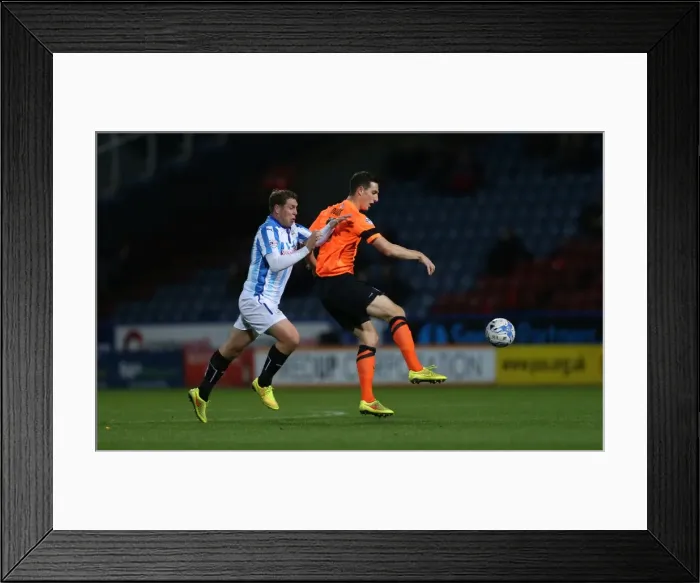 Framed Print : Lewis Dunk in Action: Huddersfield vs. Brighton & Hove Albion, October 2014 Framed Print : Lewis Dunk in Action: Huddersfield vs. Brighton & Hove Albion, October 2014