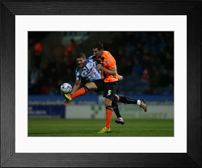 Framed Print : Lewis Dunk in Action: Huddersfield vs. Brighton & Hove Albion, October 2014