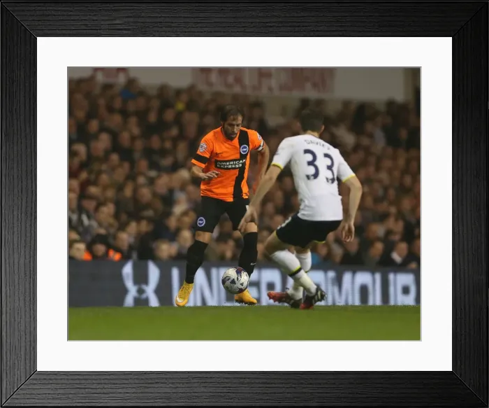 Framed Print : Brighton & Hove Albion's Inigo Calderon Faces Off Against Tottenham in Intense Capital One Cup Clash (29th October 2014)