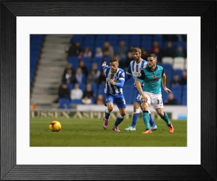 Framed Print : Joe Bennett in Action: Brighton & Hove Albion vs. Wigan Athletic, American Express Community Stadium (November 2014)