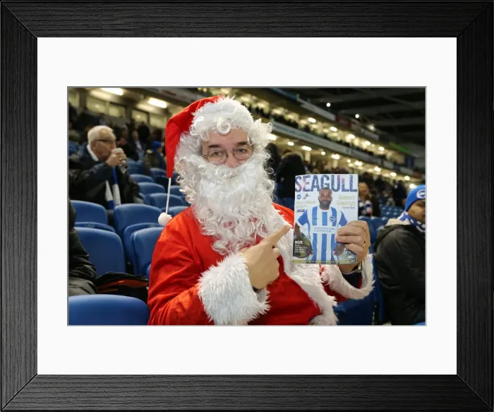 Framed Print : Santa's Invasion: Brighton and Hove Albion vs. Millwall Fans in Festive Costumes (12DEC14) Framed Print : Santa's Invasion: Brighton and Hove Albion vs. Millwall Fans in Festive Costumes (12DEC14)