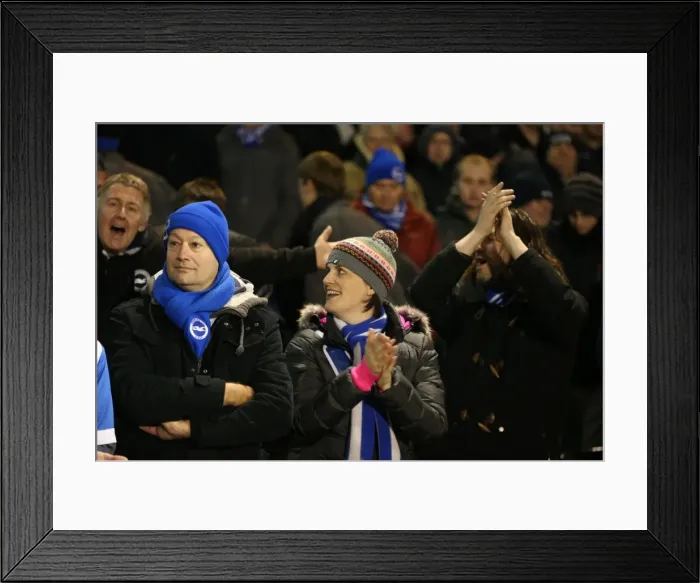 Framed Print : Brighton and Hove Albion Fans in Full Force at Fulham's Craven Cottage (29DEC14) Framed Print : Brighton and Hove Albion Fans in Full Force at Fulham's Craven Cottage (29DEC14)
