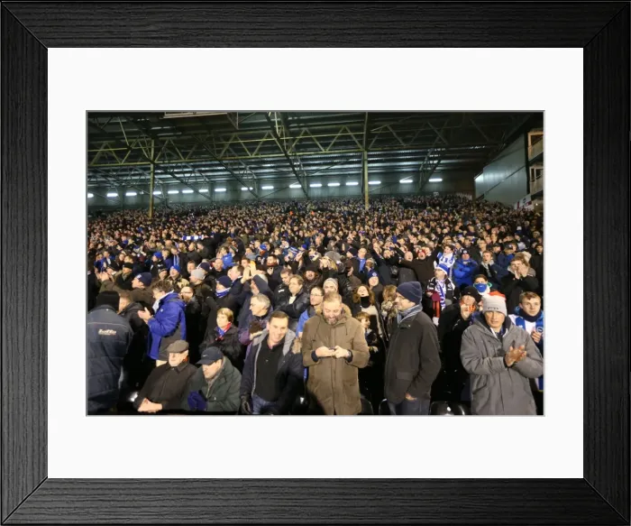 Framed Print : Brighton & Hove Albion Fans in Full Swing: A Passionate Atmosphere at Fulham's Craven Cottage (29DEC14)