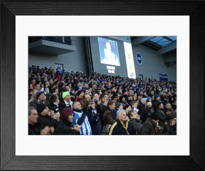 Framed Print : Brighton and Hove Albion Fans Pay Tribute: Sarah Watts Applauded at American Express Community Stadium (Brentford vs. Brighton, 17 January 2015)