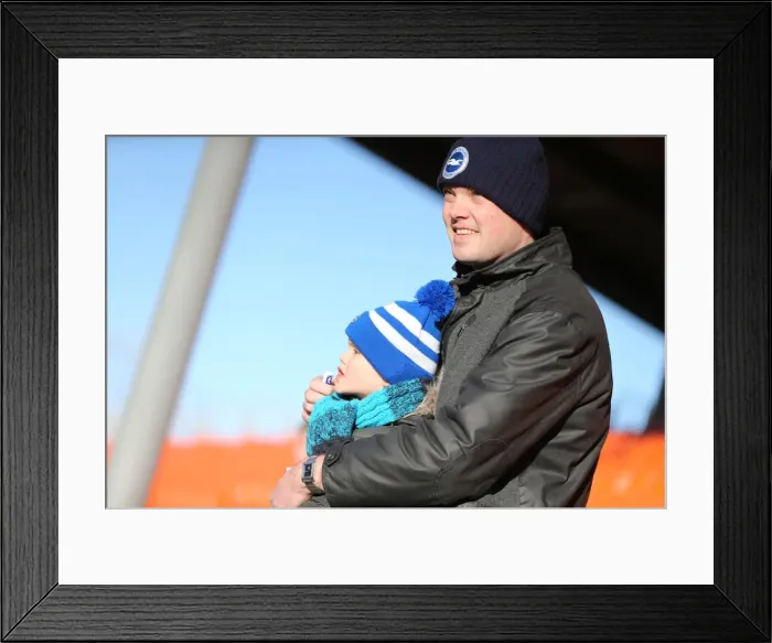 Framed Print : Brighton and Hove Albion Fans in Full Swing at Bloomfield Road vs Blackpool (31Jan15) Framed Print : Brighton and Hove Albion Fans in Full Swing at Bloomfield Road vs Blackpool (31Jan15)
