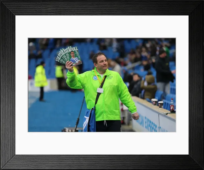Framed Print : Brighton and Hove Albion FC: Programme Seller at American Express Community Stadium during Sky Bet Championship Match vs Nottingham Forest (07FEB15)