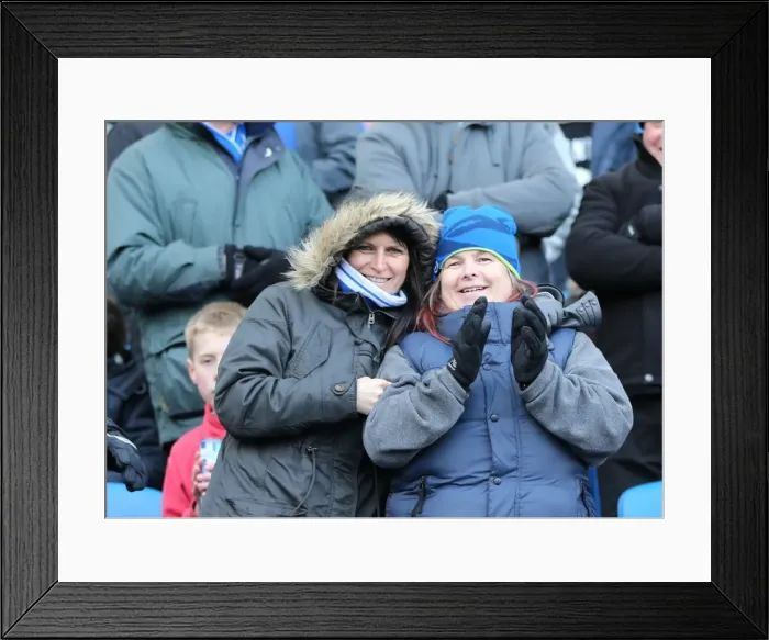Framed Print : Passionate Fan Showdown: Brighton and Hove Albion vs Birmingham City at American Express Community Stadium (21 February 2015)