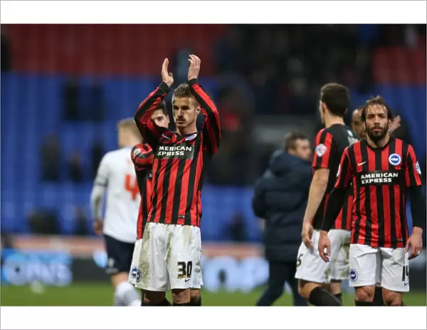 Brighton's Joe Bennett Applauds Fans Amidst Tension: Bolton Wanderers vs. Brighton and Hove Albion (28FEB15)