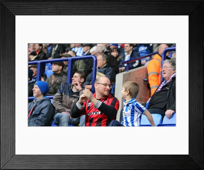 Framed Print : Brighton and Hove Albion Fans Unwavering Passion at Bolton Wanderers Championship Match, 28th February 2015