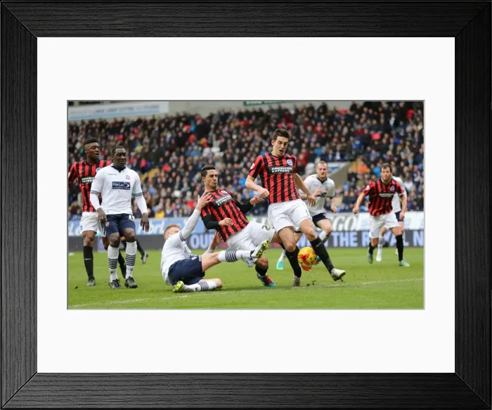 Framed Print : Lewis Dunk in Action: Brighton and Hove Albion vs. Bolton Wanderers (February 2015) Framed Print : Lewis Dunk in Action: Brighton and Hove Albion vs. Bolton Wanderers (February 2015)