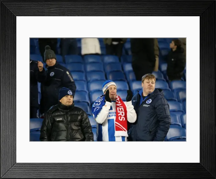 Framed Print : Passionate Showdown: Brighton and Hove Albion vs Derby County at American Express Community Stadium (3rd March 2015)