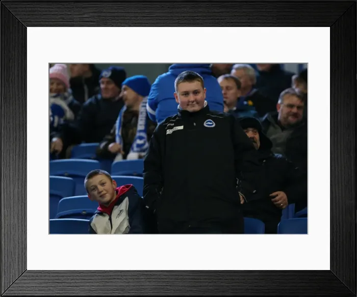 Framed Print : Passionate Albion Fans: A Moment of Pride at the American Express Community Stadium (3rd March 2015) - Brighton and Hove Albion vs Derby County
