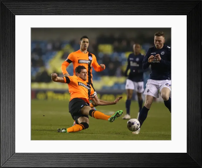 Framed Print : Gordon Greer Leads Brighton and Hove Albion in Championship Battle against Millwall (17MAR15) Framed Print : Gordon Greer Leads Brighton and Hove Albion in Championship Battle against Millwall (17MAR15)
