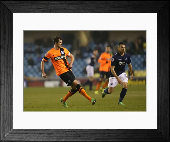 Framed Print : Gordon Greer Leads Brighton and Hove Albion in Intense Championship Clash against Millwall (17MAR15) Framed Print : Gordon Greer Leads Brighton and Hove Albion in Intense Championship Clash against Millwall (17MAR15)