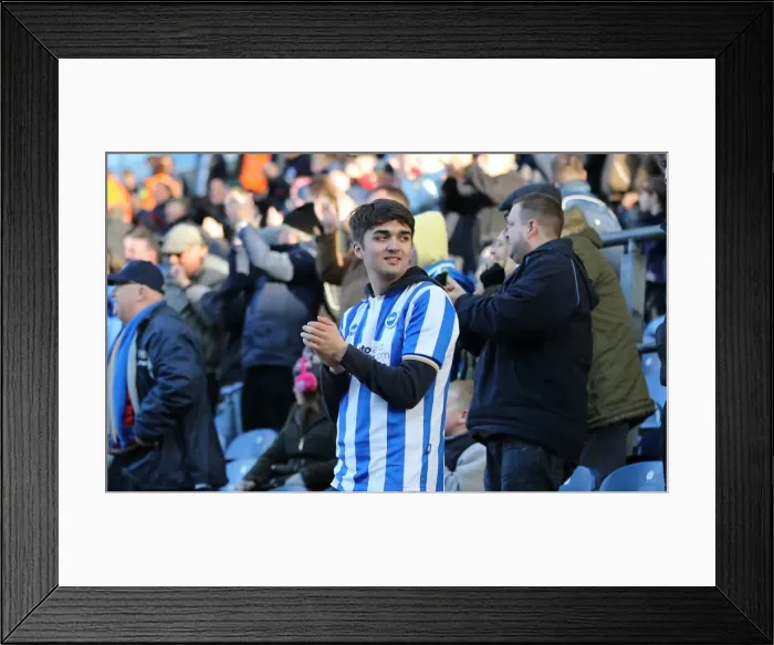 Framed Print : Brighton and Hove Albion Fans in Full Swing at Blackburn Rovers Championship Match, March 2015 Framed Print : Brighton and Hove Albion Fans in Full Swing at Blackburn Rovers Championship Match, March 2015