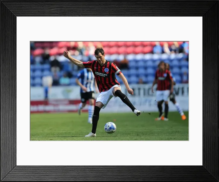 Framed Print : Gordon Greer Leads Brighton and Hove Albion in Championship Clash against Wigan Athletic (18APR15) Framed Print : Gordon Greer Leads Brighton and Hove Albion in Championship Clash against Wigan Athletic (18APR15)