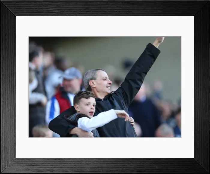Framed Print : Brighton and Hove Albion Fans in Full Force: A Sea of Colors at Wigan Athletic Championship Match (18th April 2015)