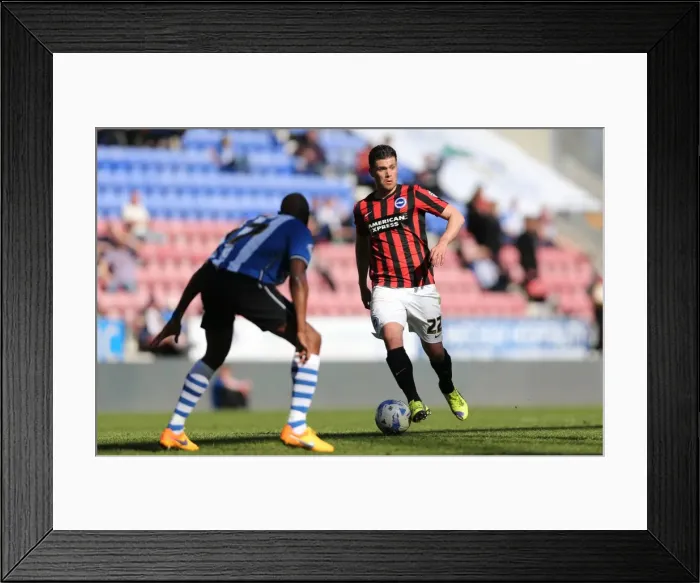 Framed Print : Danny Holla in Action: Brighton Midfielder Fights for Possession against Wigan Athletic (18APR15) Framed Print : Danny Holla in Action: Brighton Midfielder Fights for Possession against Wigan Athletic (18APR15)