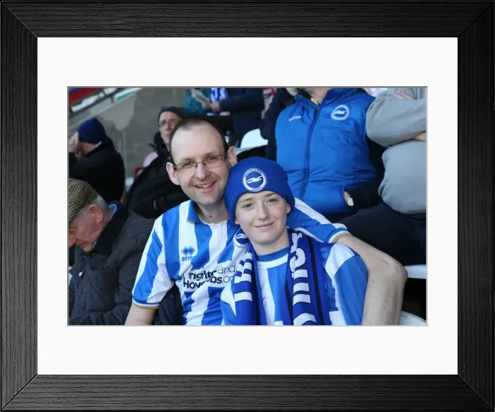 Framed Print : Brighton and Hove Albion Fans in Full Swing at Wigan Athletic Championship Match, April 2015 Framed Print : Brighton and Hove Albion Fans in Full Swing at Wigan Athletic Championship Match, April 2015