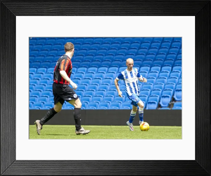 Framed Print : Brighton & Hove Albion Staff Match: 12 Team Showdown on the Pitch (25MAY15)