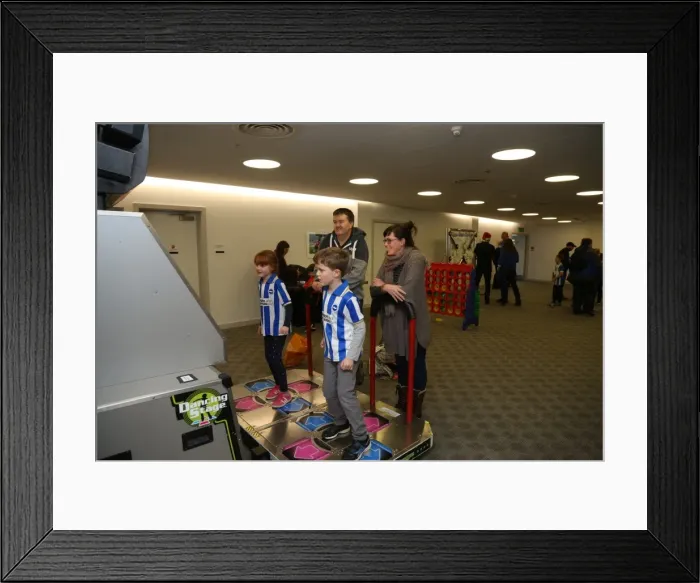 Framed Print : Young Seagulls Holiday Celebration 2015: A Merry Christmas Party at Brighton & Hove Albion FC's American Express Community Stadium Framed Print : Young Seagulls Holiday Celebration 2015: A Merry Christmas Party at Brighton & Hove Albion FC's American Express Community Stadium