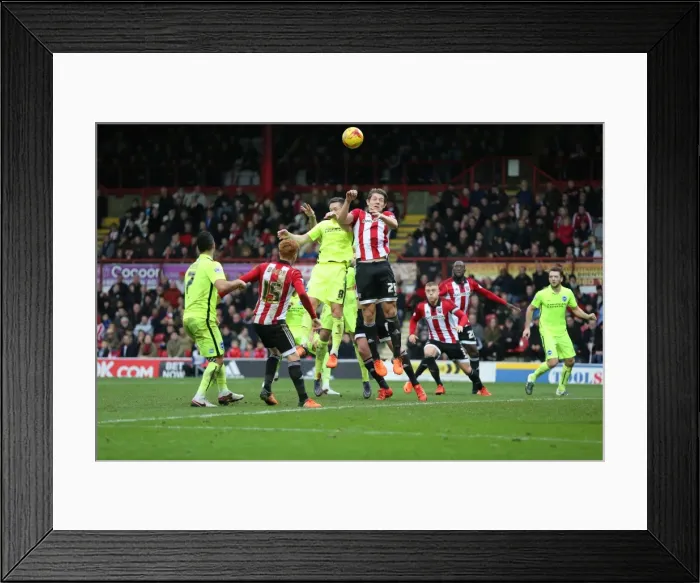 Framed Print : Championship Showdown: Brentford vs. Brighton & Hove Albion at Griffin Park (26DEC15) Framed Print : Championship Showdown: Brentford vs. Brighton & Hove Albion at Griffin Park (26DEC15)