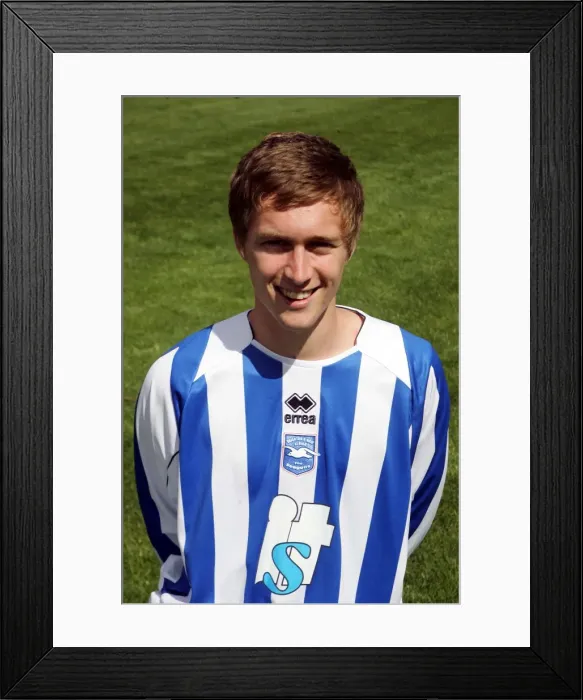 Framed Print : Focused and Determined: Jake Robinson's Intense Concentration with Brighton & Hove Albion FC Framed Print : Focused and Determined: Jake Robinson's Intense Concentration with Brighton & Hove Albion FC