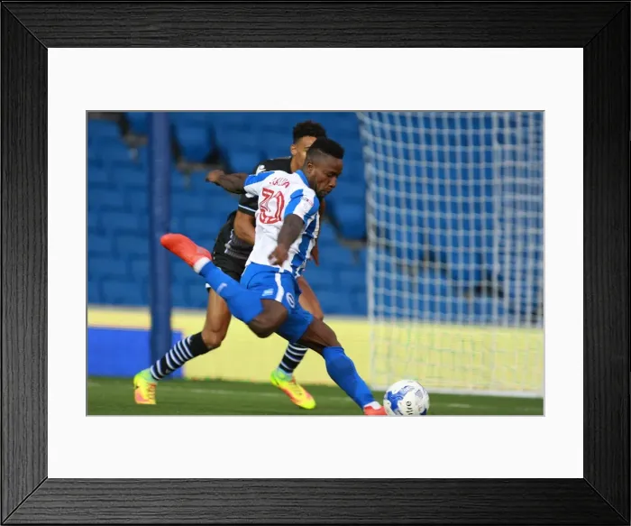 Framed Print : Brighton & Hove Albion's Kazenga LuaLua in Action against Colchester United during the EFL Cup First Round, 2016 Framed Print : Brighton & Hove Albion's Kazenga LuaLua in Action against Colchester United during the EFL Cup First Round, 2016