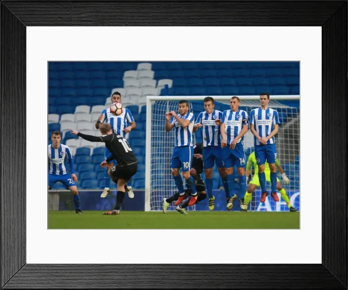 Framed Print : Brighton and Hove Albion Defend Against Ben Reeves Free-Kick in FA Cup Clash vs. Milton Keynes Dons (07JAN17) Framed Print : Brighton and Hove Albion Defend Against Ben Reeves Free-Kick in FA Cup Clash vs. Milton Keynes Dons (07JAN17)