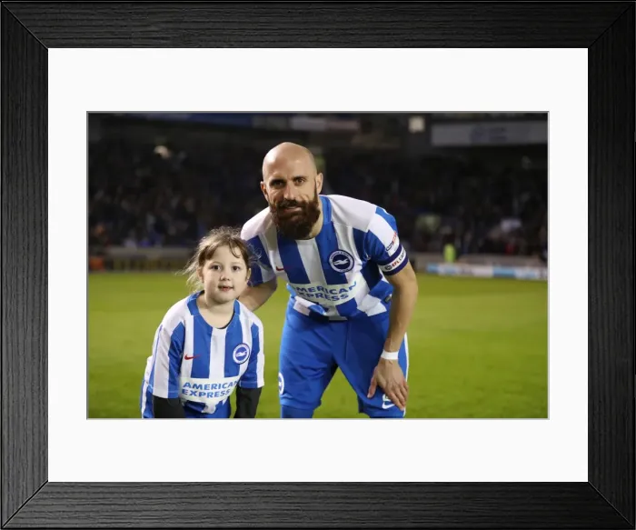 Framed Print : Brighton & Hove Albion's Bruno Saltor (Captain) and Mascot during Ipswich Town Match, EFL Sky Bet Championship 2017 Framed Print : Brighton & Hove Albion's Bruno Saltor (Captain) and Mascot during Ipswich Town Match, EFL Sky Bet Championship 2017