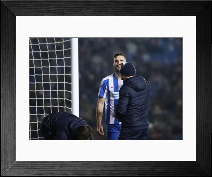 Framed Print : Brighton & Hove Albion's Shane Duffy: A Laugh Amidst Injury Amidst the Cheers of the Fans (14FEB17) Framed Print : Brighton & Hove Albion's Shane Duffy: A Laugh Amidst Injury Amidst the Cheers of the Fans (14FEB17)