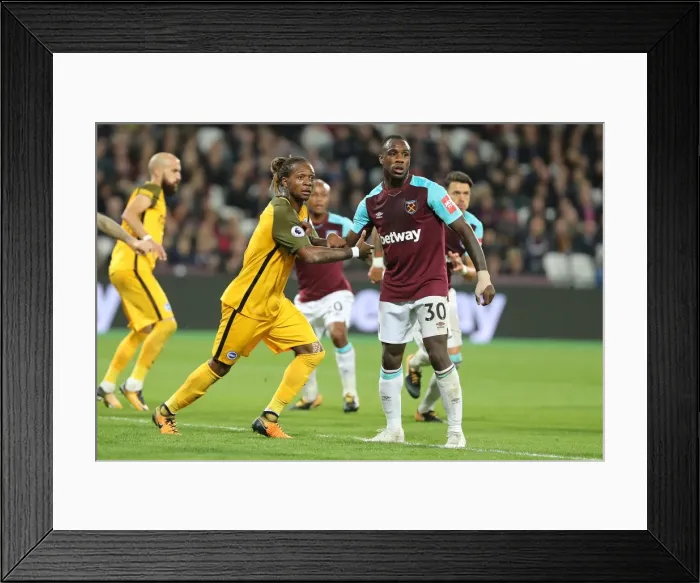 Framed Print : Bong vs. Antonio: Intense Clash Between West Ham and Brighton in Premier League (20OCT17) Framed Print : Bong vs. Antonio: Intense Clash Between West Ham and Brighton in Premier League (20OCT17)