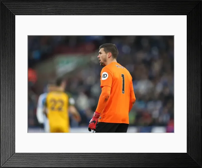 Framed Print : Decisive Moment: Huddersfield vs. Brighton & Hove Albion - Premier League Clash at The John Smiths Stadium (09DEC17)