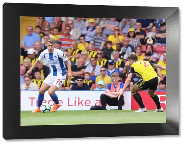 Solly March vs. Daryl Janmaat: Intense Midfield Battle at Vicarage Road - Watford vs. Brighton and Hove Albion, Premier League (11AUG18)