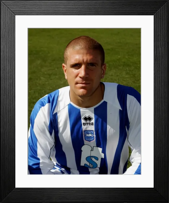 Framed Print : Focused Defender: Adam El-Abd in Action for Brighton & Hove Albion