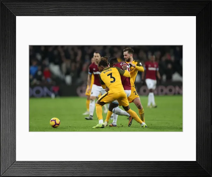 Framed Print : Premier League Showdown: Brighton and Hove Albion vs. West Ham United at The London Stadium (02JAN19) Framed Print : Premier League Showdown: Brighton and Hove Albion vs. West Ham United at The London Stadium (02JAN19)